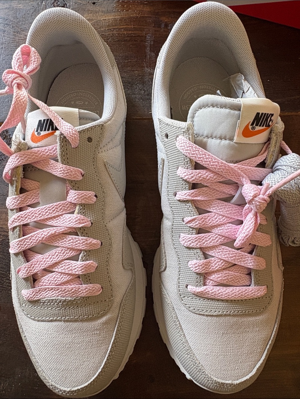 Nike Beige Canvas Sneakers with Pink Laces and Orange Logo